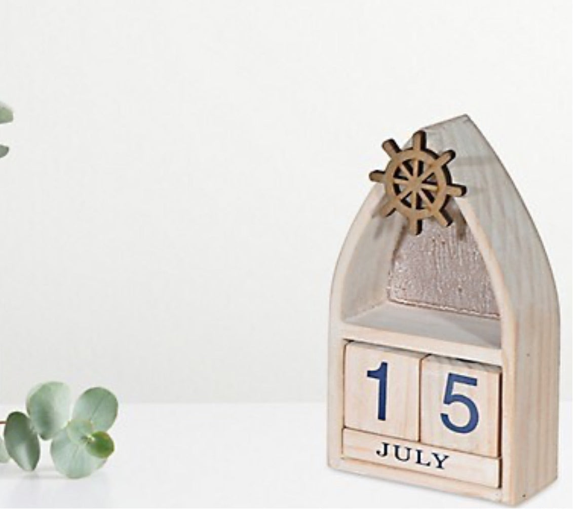 Boat With Ship Wheel And Calender