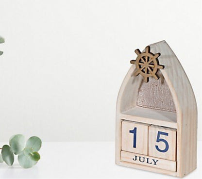 Boat With Ship Wheel And Calender