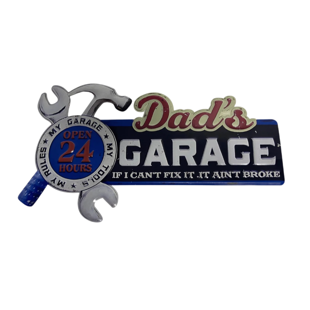 A vintage-inspired metal wall sign with weathered details. The sign features the words "Dad's Garage" in bold typography, showcasing its purpose as a dedicated workspace. The sign is a nostalgic tribute to hardworking dads and adds character to any garage or man cave.